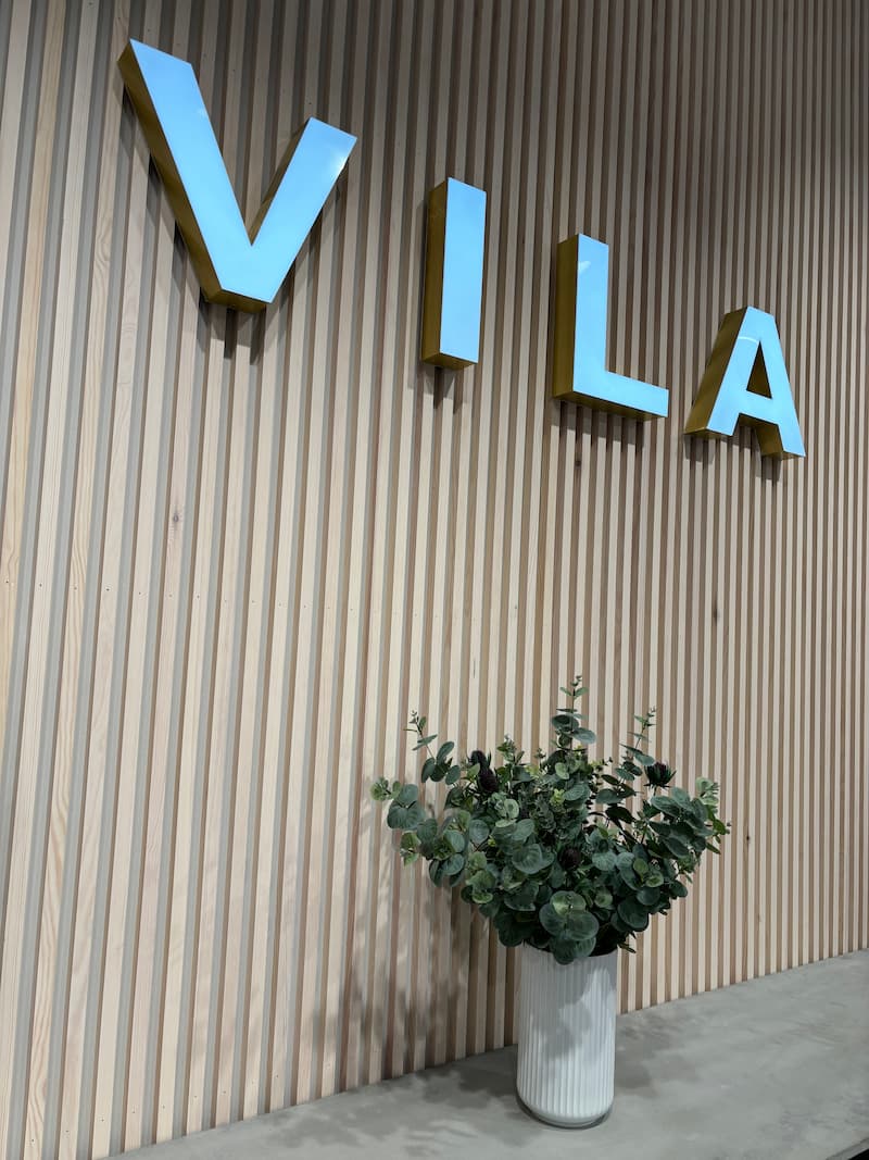 VILA Amsterdam. Logo on wooden panel